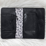 Black leather wallet for traveling