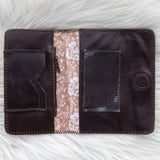 Brown leather wallet for traveling