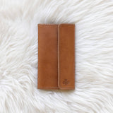 Light brown leather wallet for traveling