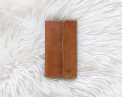 Light brown leather wallet for traveling