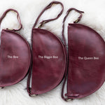 Cherry red leather pouch size comparison