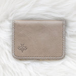 Small light tan leather wallet
