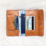 Light brown leather wallet for traveling