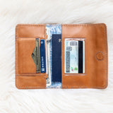 Light brown leather wallet for traveling