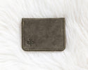 Gray fabric wallet on a white textured surface