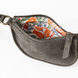 Gray pouch with floral interior on a white background