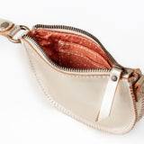 Beige leather bag with a zipper on a white background