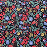 Colorful floral and bird pattern on a black background