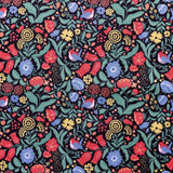 Colorful floral and bird pattern on a black background