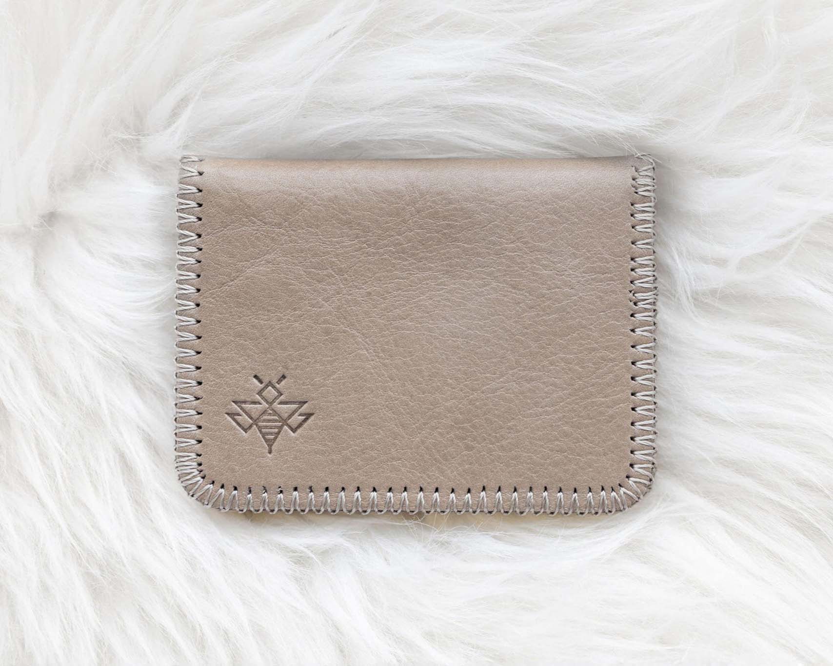 Small light tan leather wallet