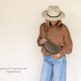 The Woven Sage & Espresso Bee worn crossbody