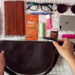 Medium dark brown leather bag packing video