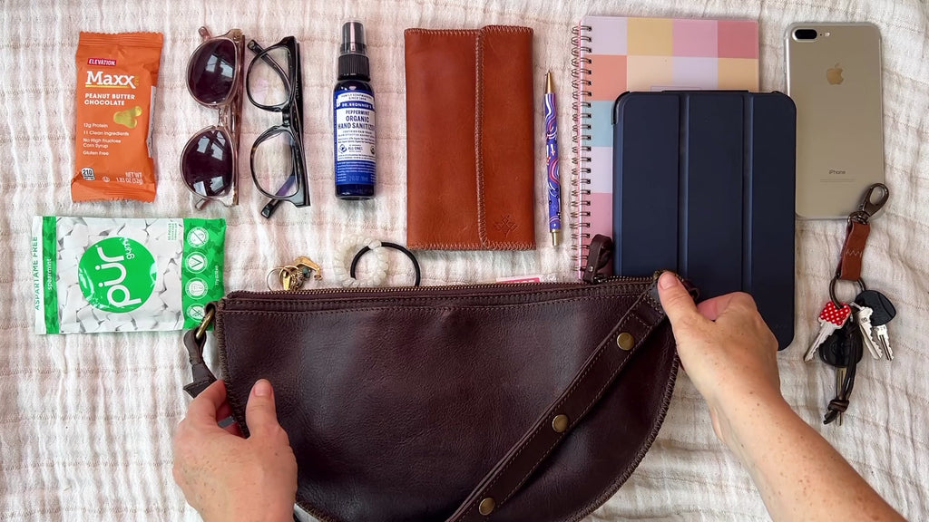 Large dark brown leather bag packing video