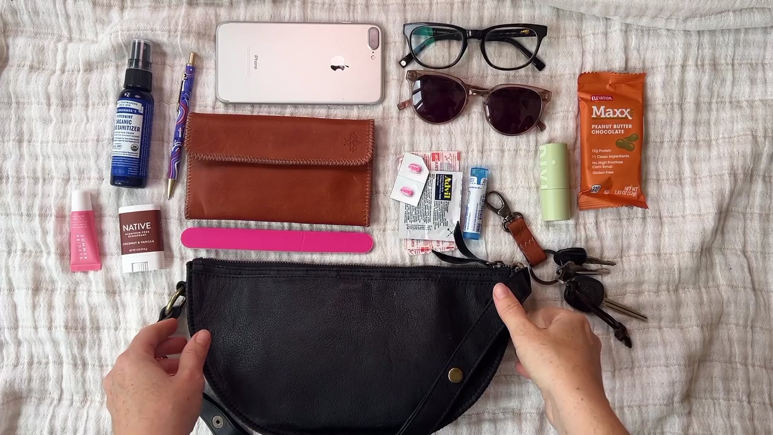 Medium black leather crossbody bag packing video