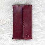 Cherry red leather wallet for traveling