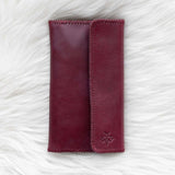 Cherry red leather wallet for traveling
