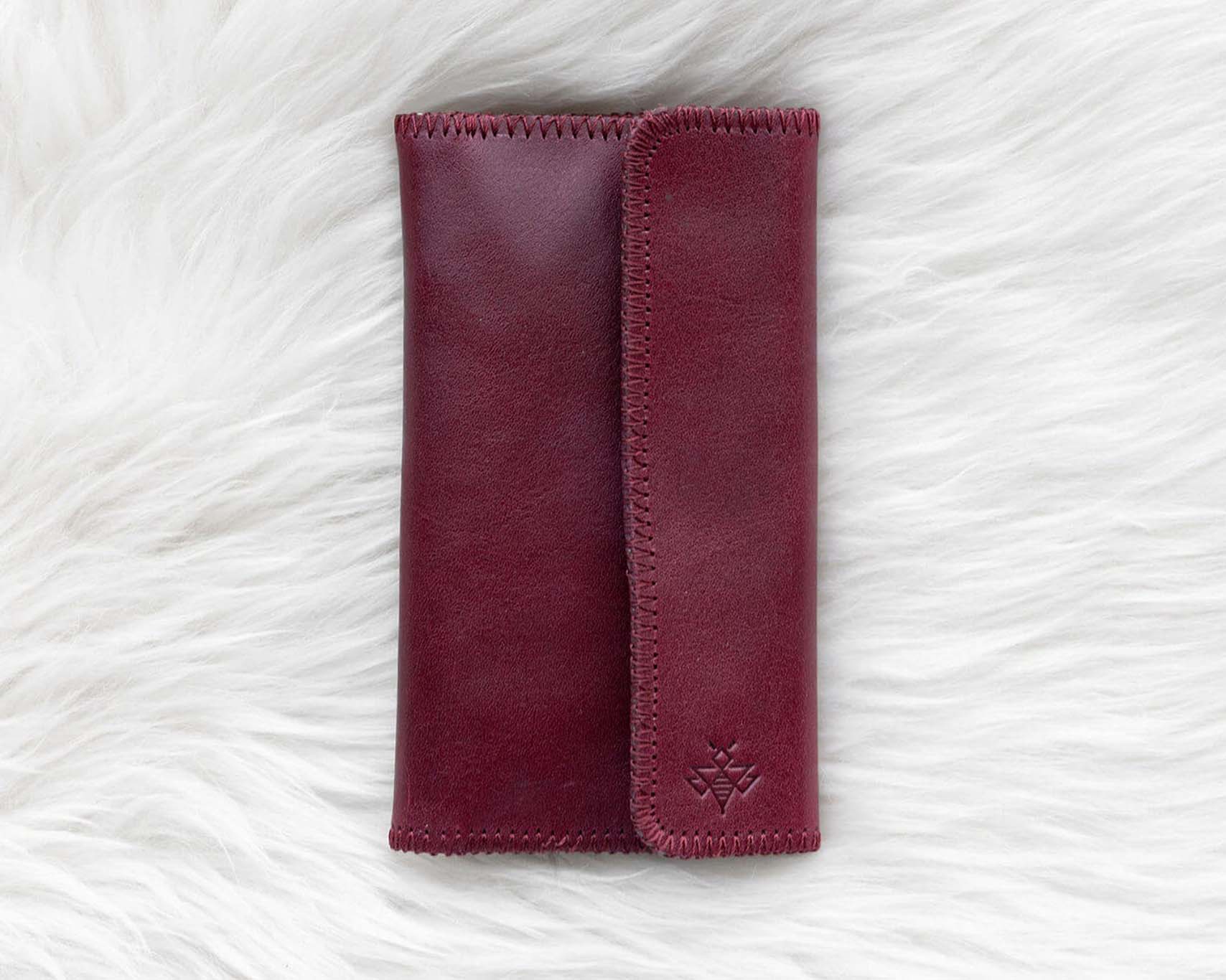Cherry red leather wallet for traveling