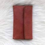 Leather cognac wallet for traveling