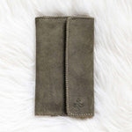 Moss green suede travel wallet, front view
