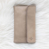 Light tan leather wallet for traveling